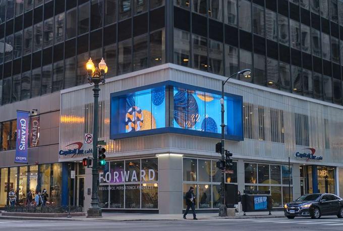 Transparent LED displays on glass facades use natural convection cooling for reliable outdoor operation